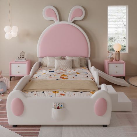 Lit enfant simple 90x200 cm avec coffre de rangement, escalier et toboggan intégrés, tête de lit oreilles de lapin, sommier lattes bois et PU, blanc et rose