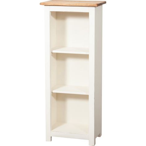 Petite bibliothèque de pays en bois de tilleul massif structure blanc vieilli finition naturelle.Fabriqué en