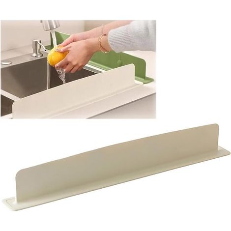 Il rivestimento paraschizzi per la cucina, realizzato in silicone e rimovibile, fornisce una barriera impermeabile per piani di lavoro e bagni. (1/5)
