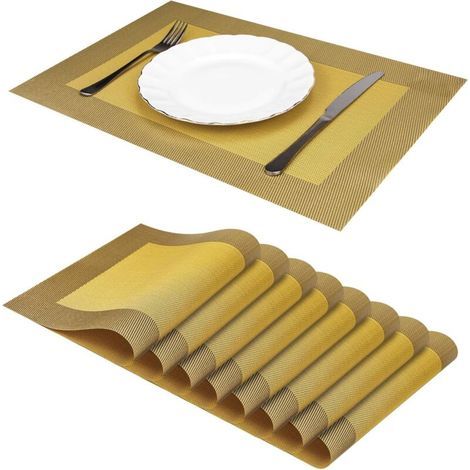 Set mit 8 rutschfesten und abwaschbaren, hitzebeständigen PVC-Untersetzern für Esstische. (1/5)