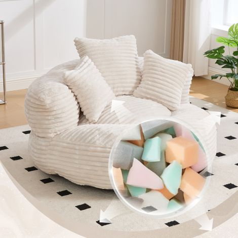 Le pouf en velours côtelé est doté d'un dossier haut et est livré avec trois coussins, convenant aussi bien aux adultes qu'aux enfants (velours côtelé beige). (1/4)