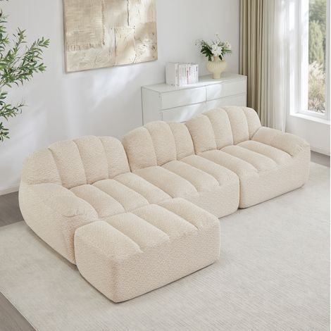 Canapé d’angle modular de tejido fleece granulado beige blanco con otomana, 3 plazas, diseño sin estructura (1/5)