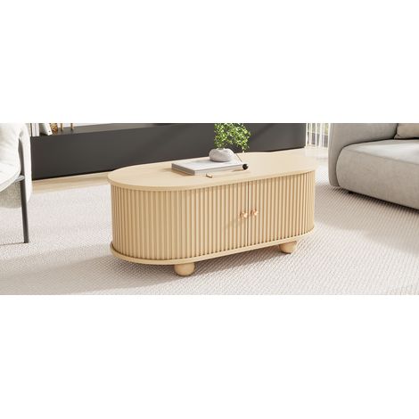 Table de salon ovale, avec un espace de rangement et des portes coulissantes. Meuble multifonctionnel qui occupe peu d’espace. Fabriqué dans des couleurs en bois.