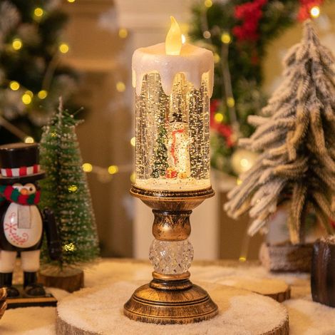 Bougie de Noël bonhomme de neige musicale, idéale pour la décoration intérieure et les cadeaux. (1/4)