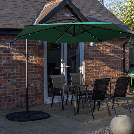 Outdoor 4 Person Rectangular Glass Top Garden Dining Table Chairs With Green Banana Lit Parasol and Base (1/5)