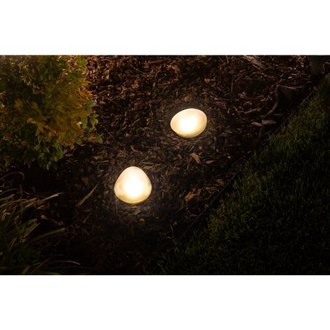 Galet solaire en verre dépoli, une lueur douce comme un caillou chaud, posé au cœur du jardin (1/3)