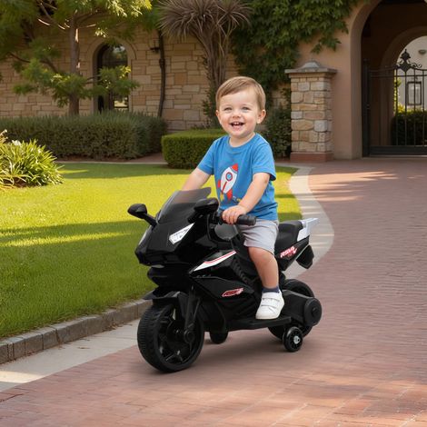 Moto eléctrica infantil, con batería de 6 V, efectos de luz y sonido, ruedines de apoyo, 75x36x49 cm, color negro.