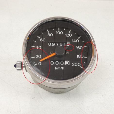 [PRODUIT D'OCCASION] Compteur entourage chromé fond noir 200km/h origine pour moto