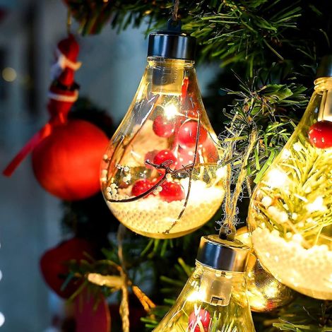 5 boules de Noël à suspendre avec lumières LED et neige artificielle (1/2)