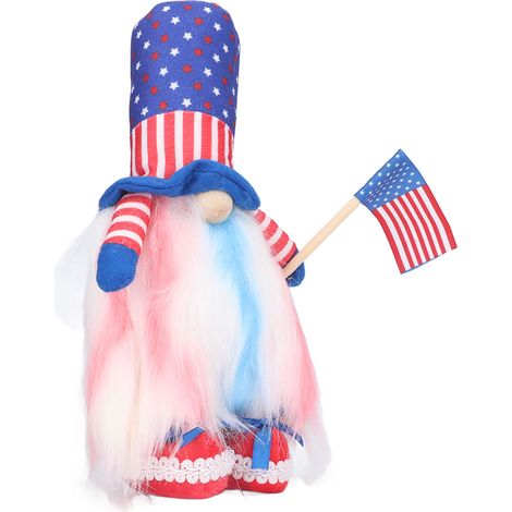 Gesichtslose Puppe zum amerikanischen Unabhängigkeitstag, liebenswerte stehende Figur, die eine Flagge schwenkt, Rudolf-Schaufensterdekoration mit roten Schuhen. (1/5)