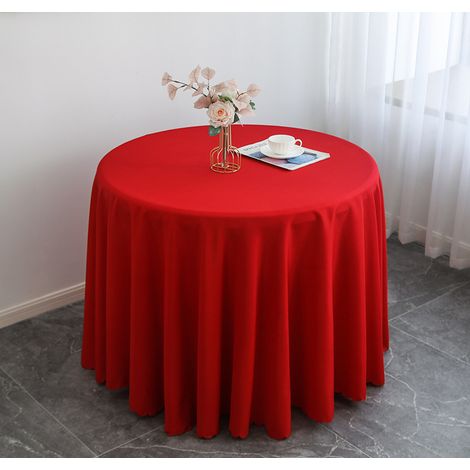Cette nappe ronde rouge en polyester est parfaite pour une table basse, une table de pique-nique ou une table de jardin. Diamètre : 220 cm. (1/5)