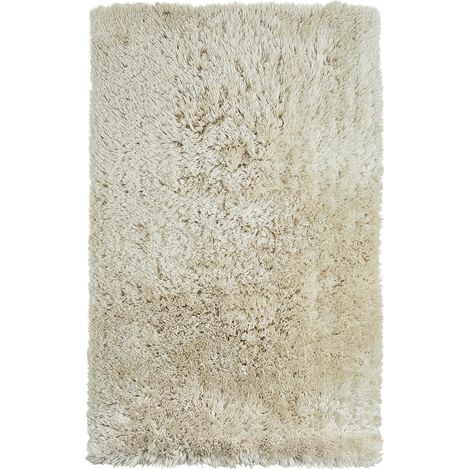 Alfombra peluda beige de pelo largo 140 x 200 cm rectangular con mechones de algodón Cide (1/5)