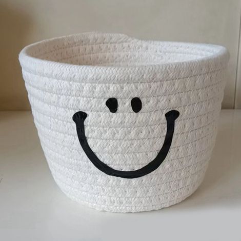 Panier de rangement rond en fil de coton tissé à la main, blanc, orné d'un smiley et d'une anse en forme d'oreille de chat. (1/5)