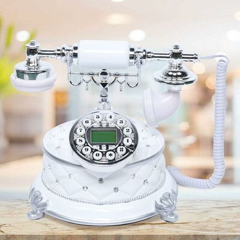 Retro-Nostalgie-Festnetztelefon, schnurgebundenes Telefon, weißes schnurgebundenes Telefon, Dekoration