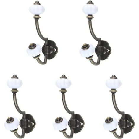 Grifo mezclador de lavabo europeo antiguo de estilo retro con agua fría y caliente, acabado en bronce, diseño vintage con rociador, ideal para balcón, bar, aseo o lavamanos.