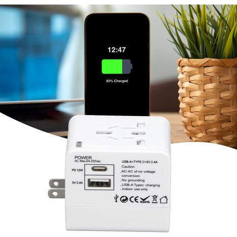 Adaptador de viaje universal con puertos USB-A y USB-C, convertidor de energía blanco seguro para carga rápida y móvil. (1/5)
