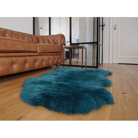 Alfombra decorativa de piel de oveja color verde oscuro y aguamarina. Piel de oveja auténtica teñida. Azul claro. (1/5)