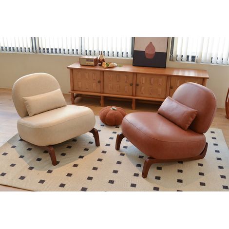 Sillón tapizado sin brazos de piel sintética marrón con patas de madera (1/5)
