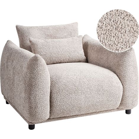 Poltrona in tessuto bouclè beige e gambe nere Jamsa