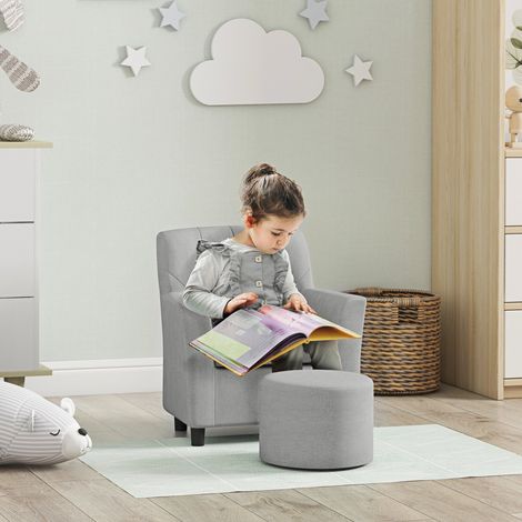 Fauteuil enfant avec repose-pieds, dossier à motif losanges, assise moelleuse, structure en bois, gris