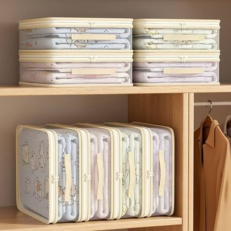 Ce lot de 8 sacs de rangement pliables pour literie est doté d'une fermeture éclair robuste et durable, permettant de gagner de la place dans les placards et sous les lits pour une organisation pratiq (1/5)