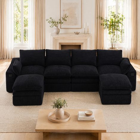 Sofá modular de 4 plazas en pana negra con 2 pufs, cojines y bolsillos laterales DESVIAE (1/5)