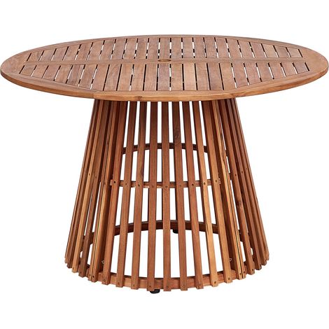 Beliani – Table ronde d'extérieur 120 cm en acacia huilé – 4 places – Pied unique pour espace jambes – Trou pour parasol intégré