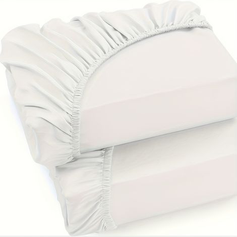 Lot de 2 draps en jersey 100 % coton (130 g/m²), hypoallergéniques et respirants, avec un volant de 30 cm. Dimensions : 160 x 200 cm. Couleur : blanc. (1/5)