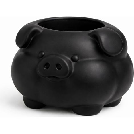 Ein Behälter in Form eines dicken schwarzen Schweins