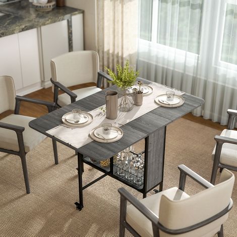 Table pliante de cuisine extensible salle à manger sur roulettes jusqu'à 6 personnes étagère intégrée. 6 roues. Gris