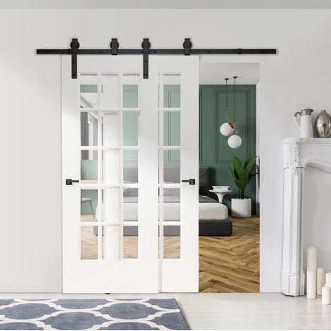 Système de porte coulissante double pour deux portes en bois, rail 200 cm en acier noir, charge 90 kg, kit complet de montage avec guide anti-saut  CHICFURN (1/5)
