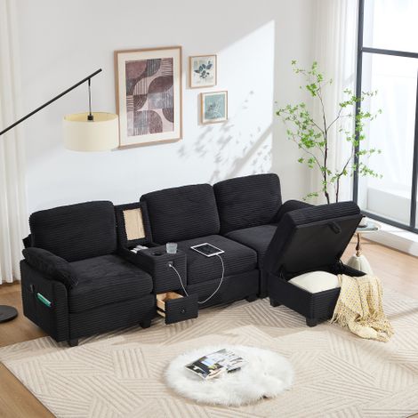 Großes Cord-Sofa mit Komfortschaum. Ausstattung: Abnehmbare Mittelkonsole (2 Cup-Halter + Stauraum), USB-C-Anschluss, Seitentasche, Stauschublade, beweglicher Stau-Ottoman. Für Komfort und Funktion.