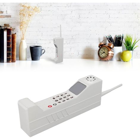 Le modèle de téléphone portable « Big Brother » a connu un certain succès. C'était un accessoire de cinéma rétro typique de Hong Kong, fabriqué en fer forgé et décoré en blanc. (1/5)