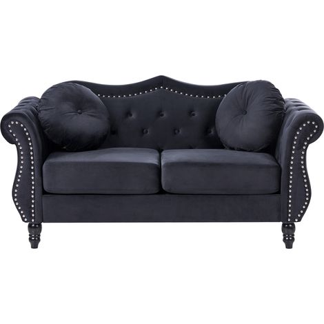 Sofá 2 plazas tapizado en terciopelo negro botones de adorno apoyabrazos enrollados estilo glam Skien