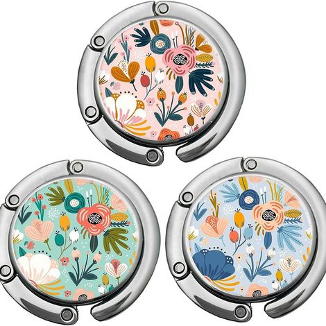 A set of 3 foldable tablecloth hooks - compact and lightweight - with a floral pattern - suitable for tables up to 5 cm thick. (1/5)