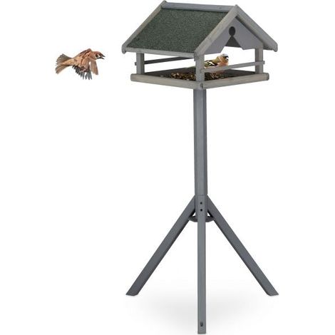 Mesa para pájaros gris en poste