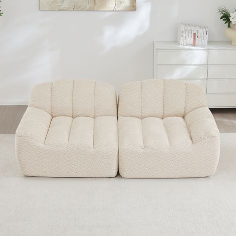 Modulares Sofa aus granuliertem Fleece in Beige-Weiß, rahmenlos, mit Ottoman und flexibel kombinierbaren Modulen