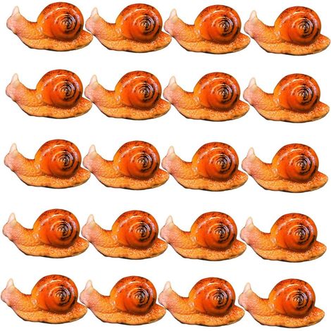 Kleine Schneckenornamente aus Kunstharz als dekorative