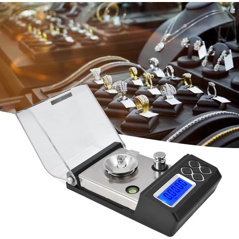 Balance numérique portable précise pour bijoux, pèse jusqu'à 50g avec précision de 0.001g, idéale pour peser diamants et pierres précieuses.