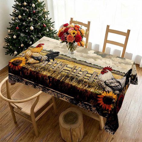 Nappe rectangulaire à motif coq et tournesols, idéale pour les pique-niques et autres occasions spéciales. Résistante et parfaite pour la cuisine et les repas en plein air à la ferme. (1/4)