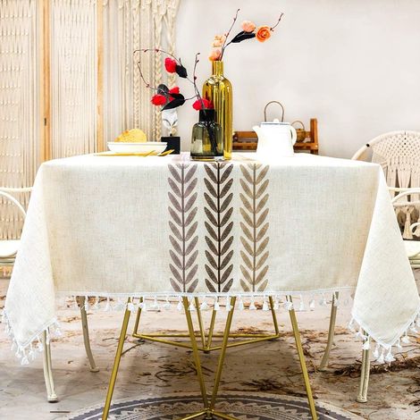 Nappe carrée imperméable 140x140 cm, en coton et lin, avec pompons, élégante, idéale pour la décoration de table de cuisine. (1/5)