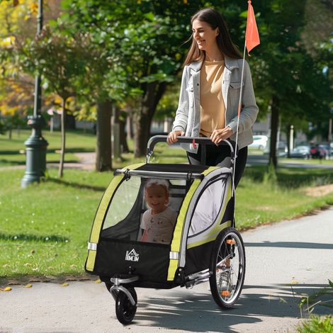 Remolque y cochecito para niños, diseño 2 en 1 con freno, arnés de 5 puntos, remolque para bicicleta con bolsillos laterales, reflectores y bandera, amarillo.