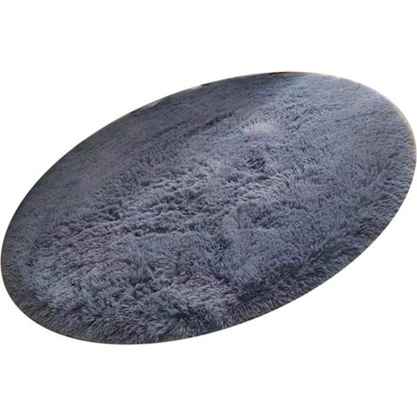 Tapis rond en fibre de polyester style nordique, long, moelleux et doux, gris, idéal pour la chambre à coucher. (1/5)
