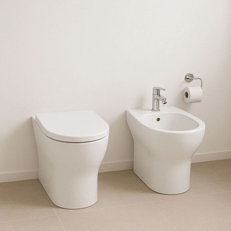 Vaso wc + bidet a terra filo parete serie Pratica, ceramica bianca AZZURRA