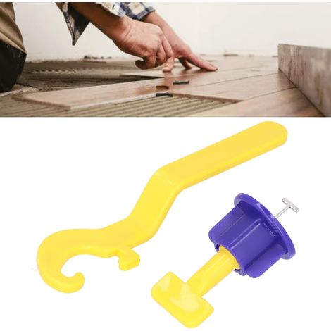 Système de nivellement de carrelage horizontal à cales, avec clé spéciale bleue et jaune. (1/5)