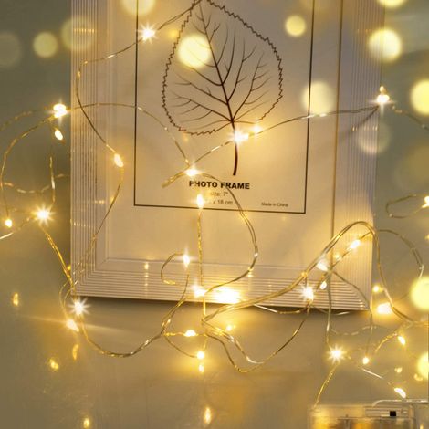 1 guirnalda de luces LED, cable plateado, 30 LED en forma de estrella, 3 metros, funciona con pilas AA, para interior/exterior, decoración para fiestas navideñas. (1/5)