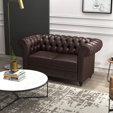 Canapé 2 places style Chesterfield avec coussin amovible. En similicuir, bois et métal. 160 x 84 x 80 cm. Marron.