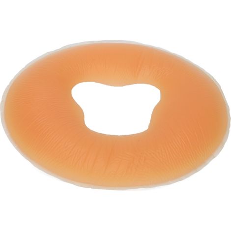 Oreiller de beauté en silicone pour massage du visage, relaxation et douceur, idéal pour les salons de beauté et les spas. Oreiller allongé sur le ventre.