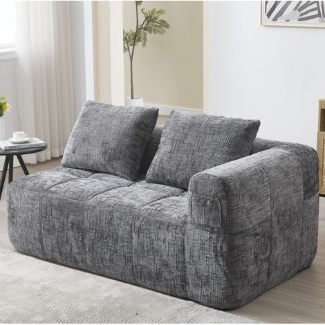 Sofá chaise longue relax con bolsillos laterales gris OKMYHOME (1/5)