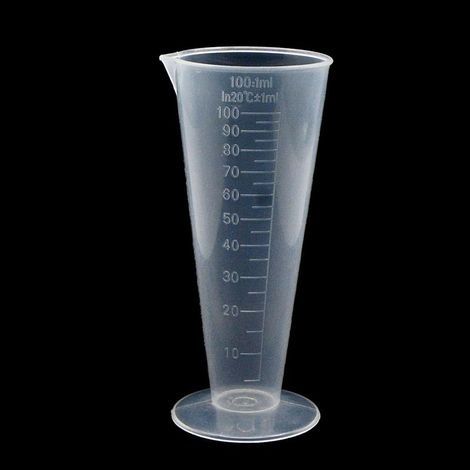 Un verre doseur gradué d'une capacité de 100 ml un modèle pratique. (1/5)